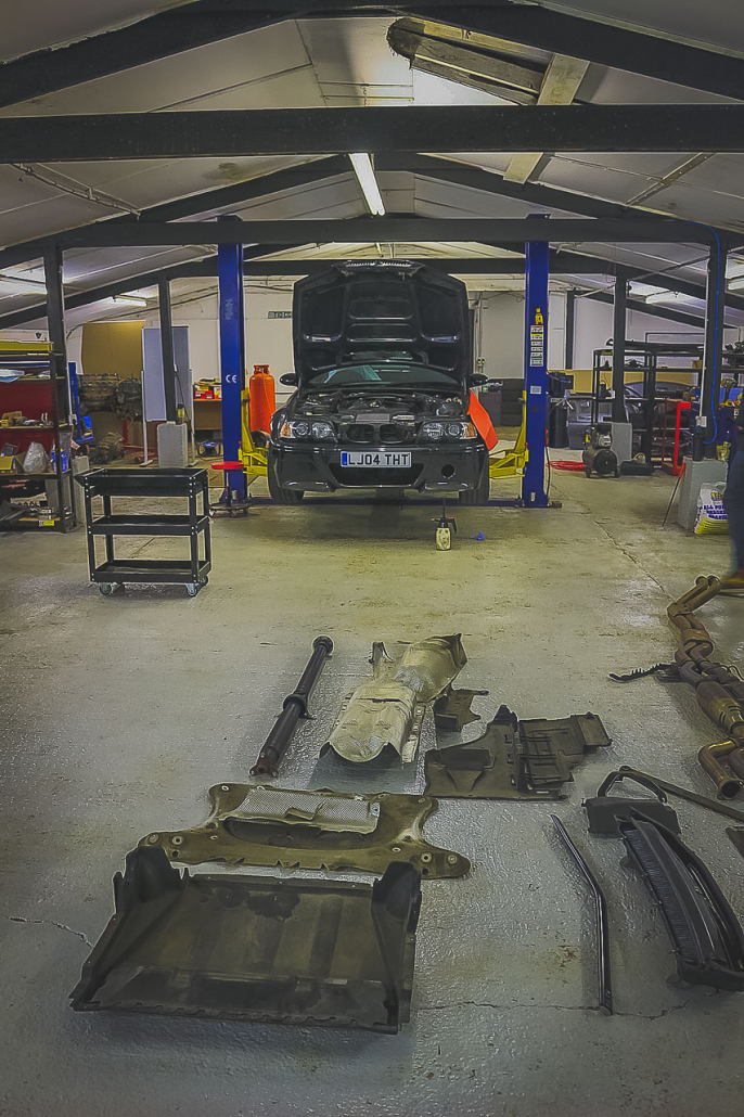 BMW M3 CSL And Parts In Revolt Autoworks Workshop